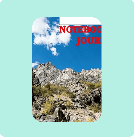 Notebook journal with mountain and sky cover design.